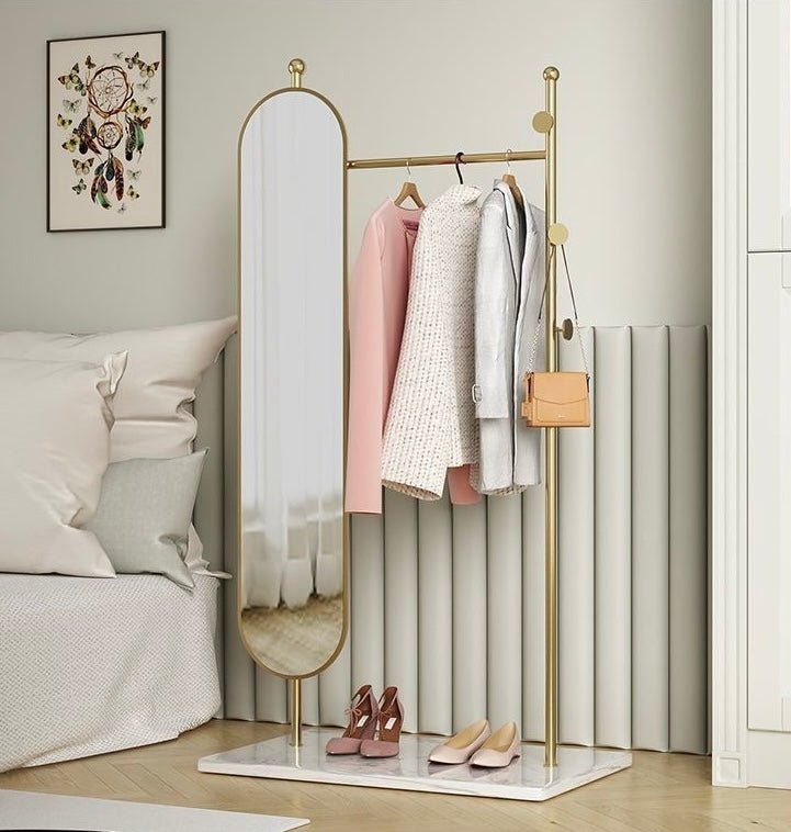 Clothes rack with oval full length Mirror